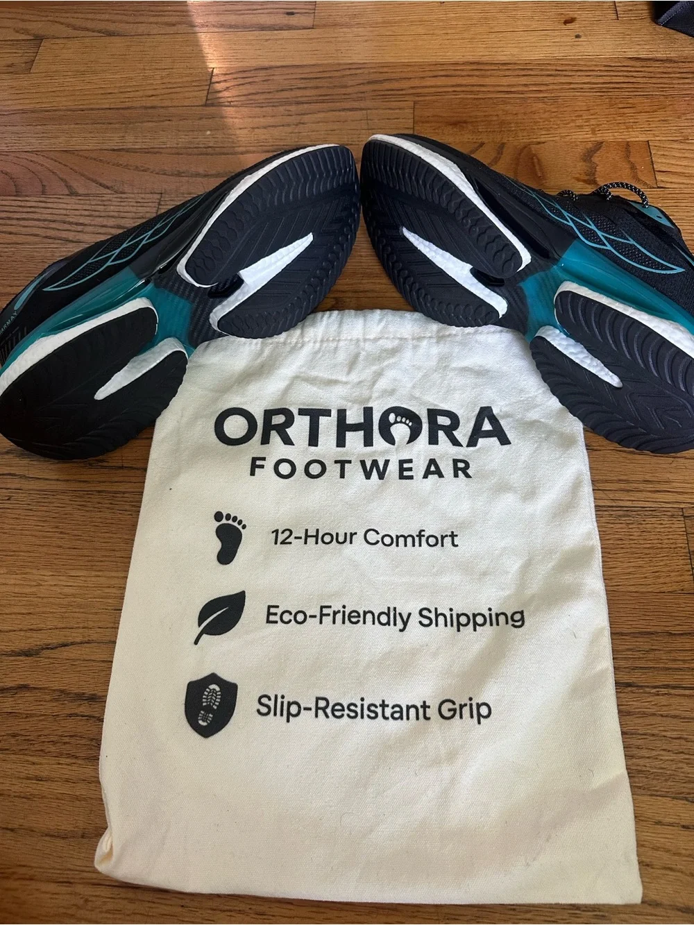 Orthora Black Sneakers with Teal Accents